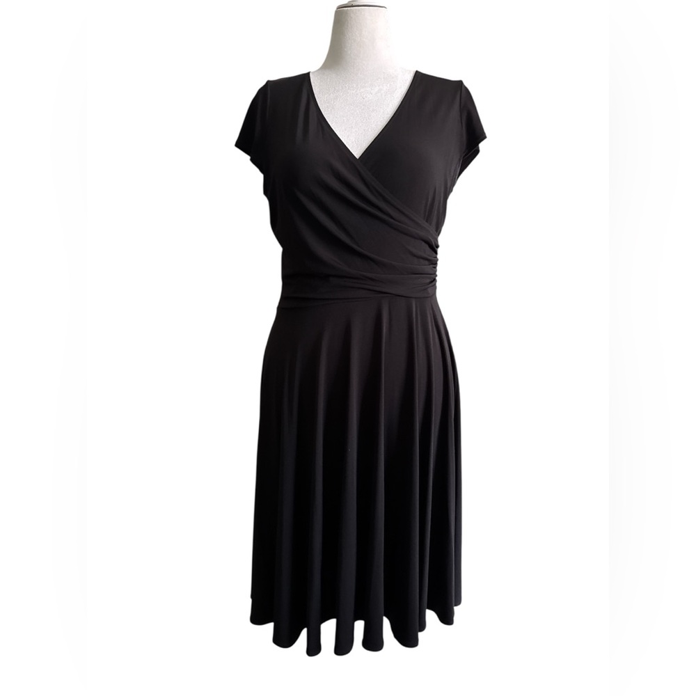 Black, faux wrap, short sleeved dress by Maggy London, size 16, gently used.